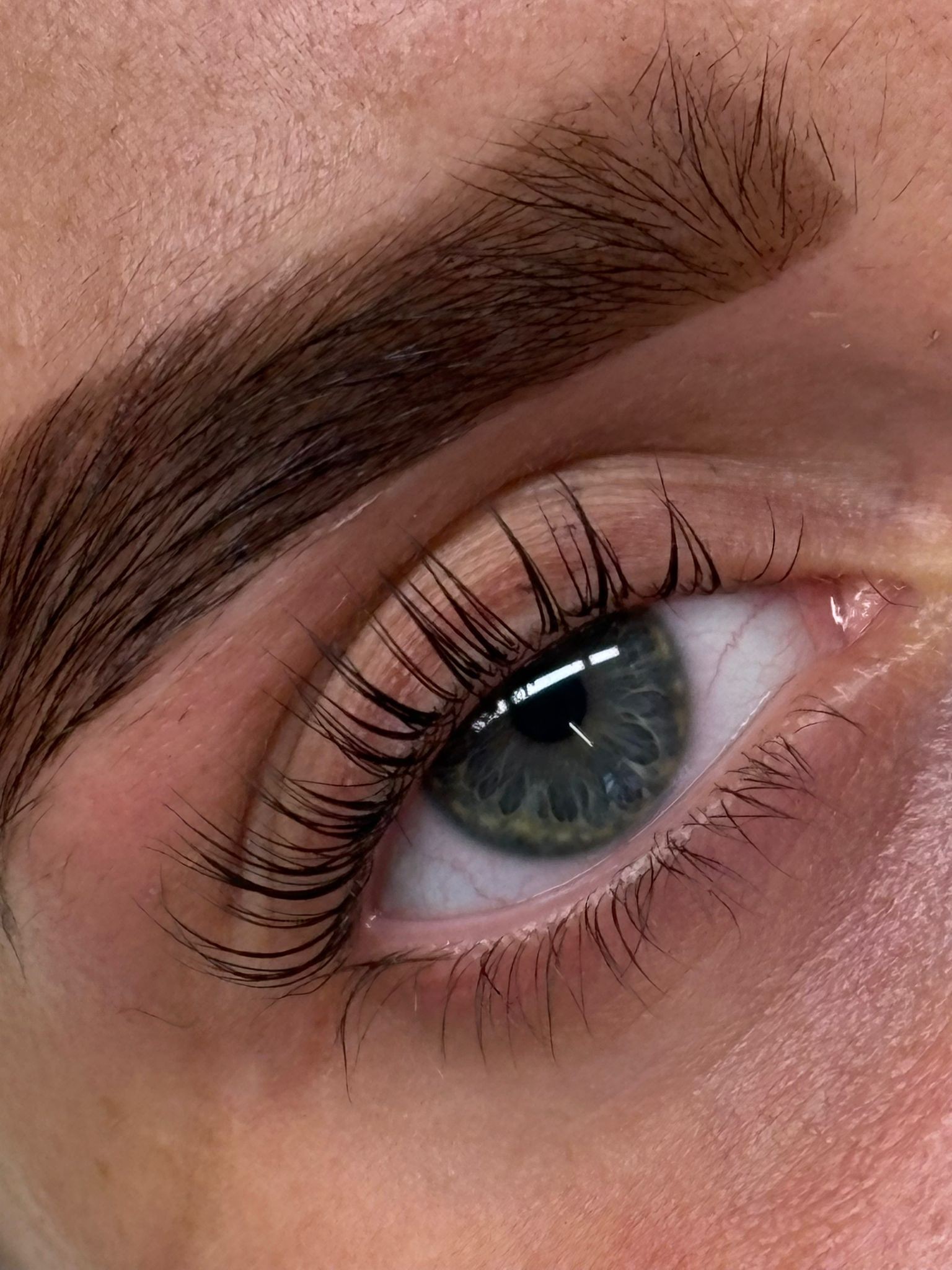 Brow treatment in progress in Coventry by Izzy Lewis